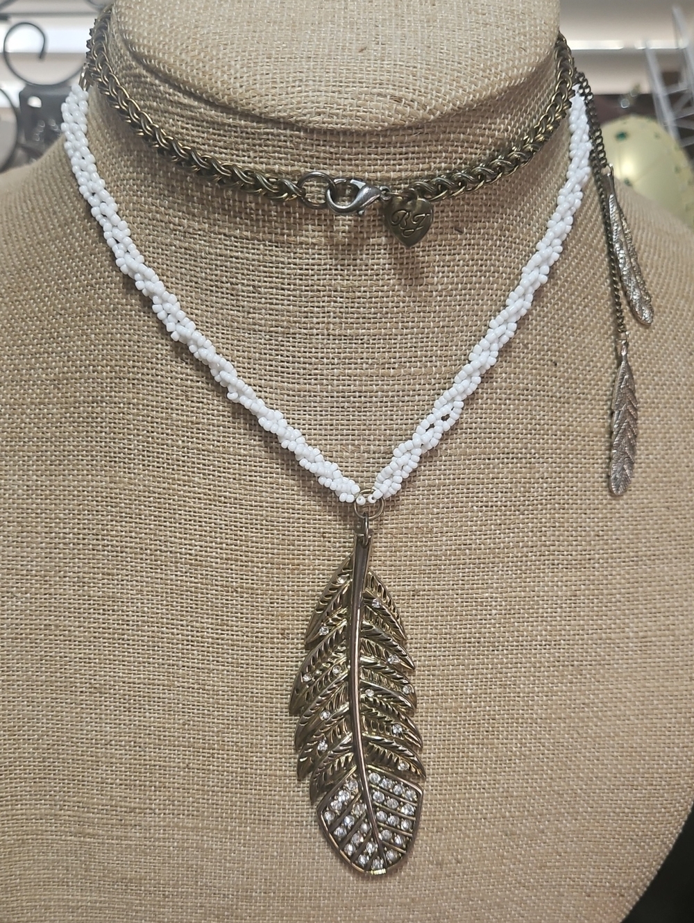 Betsey Johnson White Beaded Necklace with Gold-Tone Feather Charm